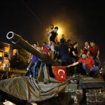 People stand on a Turkish army tank in Ankara, Turkey July 16, 2016.   REUTERS/Tumay Berkin - RTSI7T9